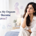 Indian woman reflecting on a sudden change in orgasm intensity and sexual wellbeing in a modern wellness setting.